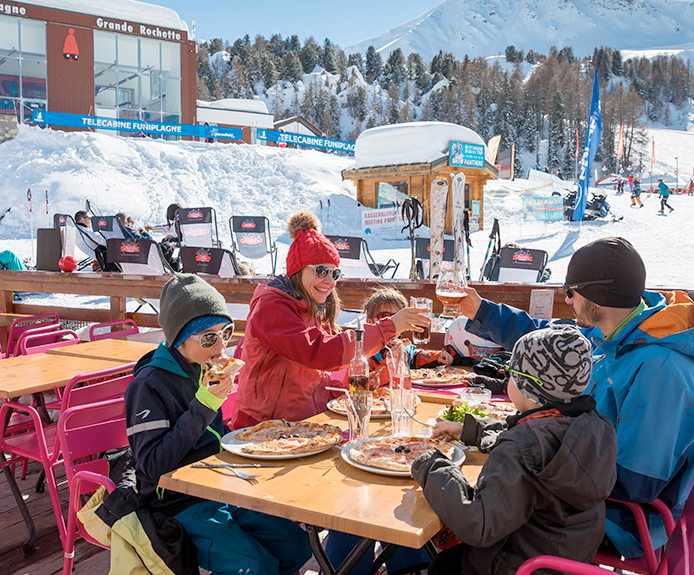 Family eating at a ski resort
